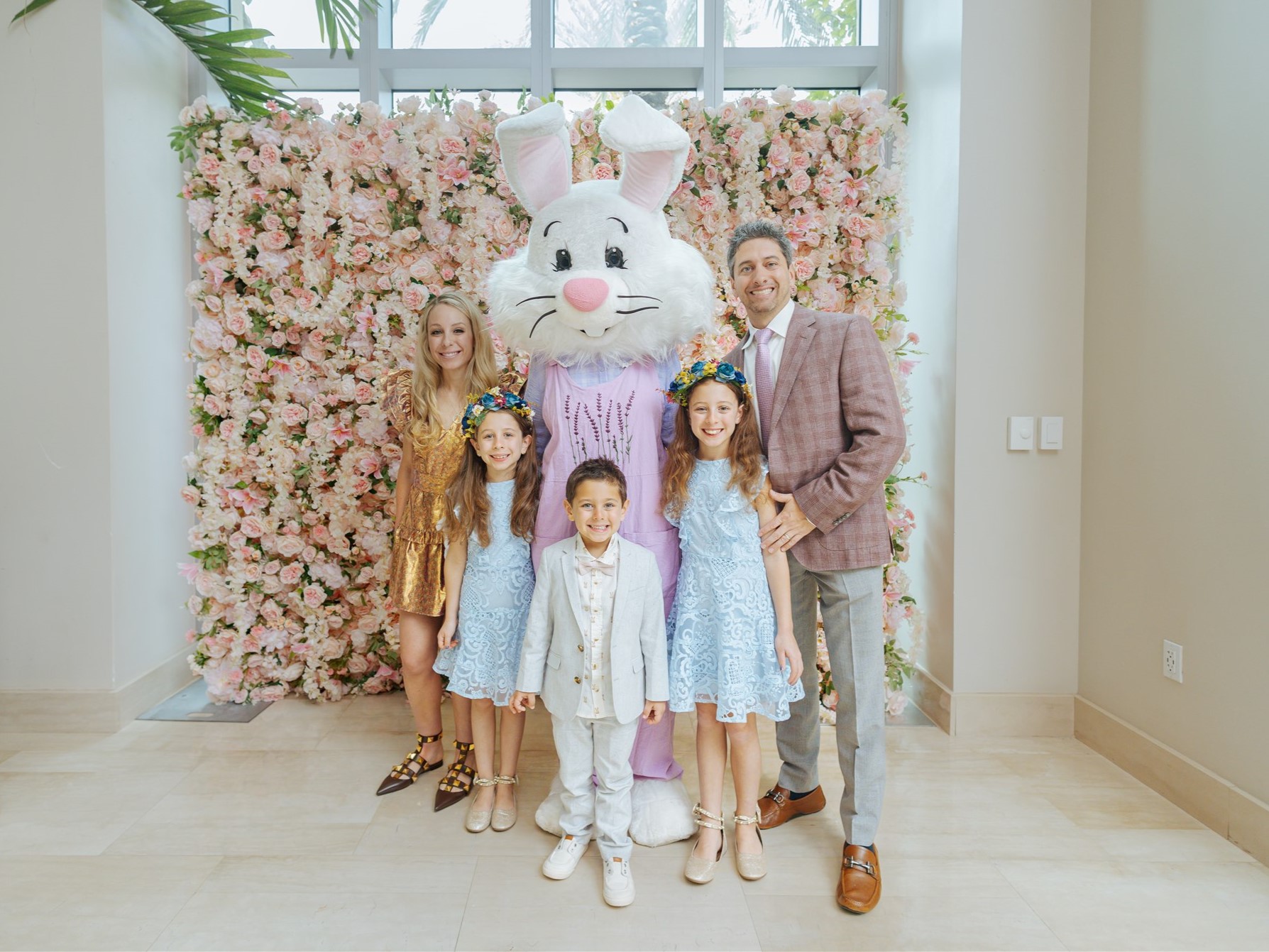 Family posing with the Easter Bunny