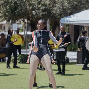 Dancer Leading marching band on the lawn