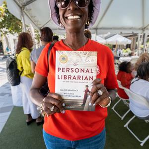Member of Delta Sigma Theta and a copy of 'Personal Liberation' by Victoria Christopher Murray