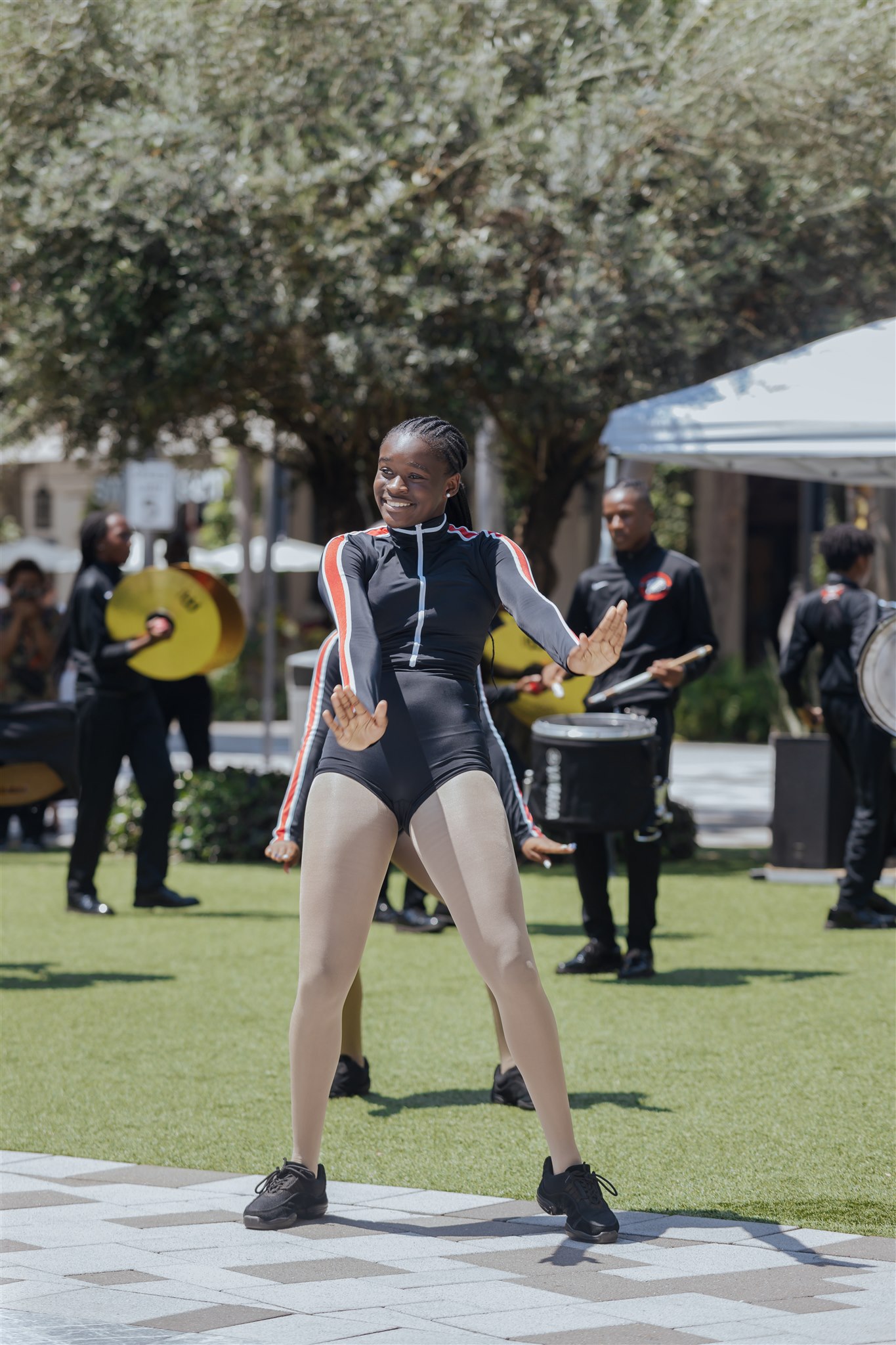 Dancer Leading marching band on the lawn
