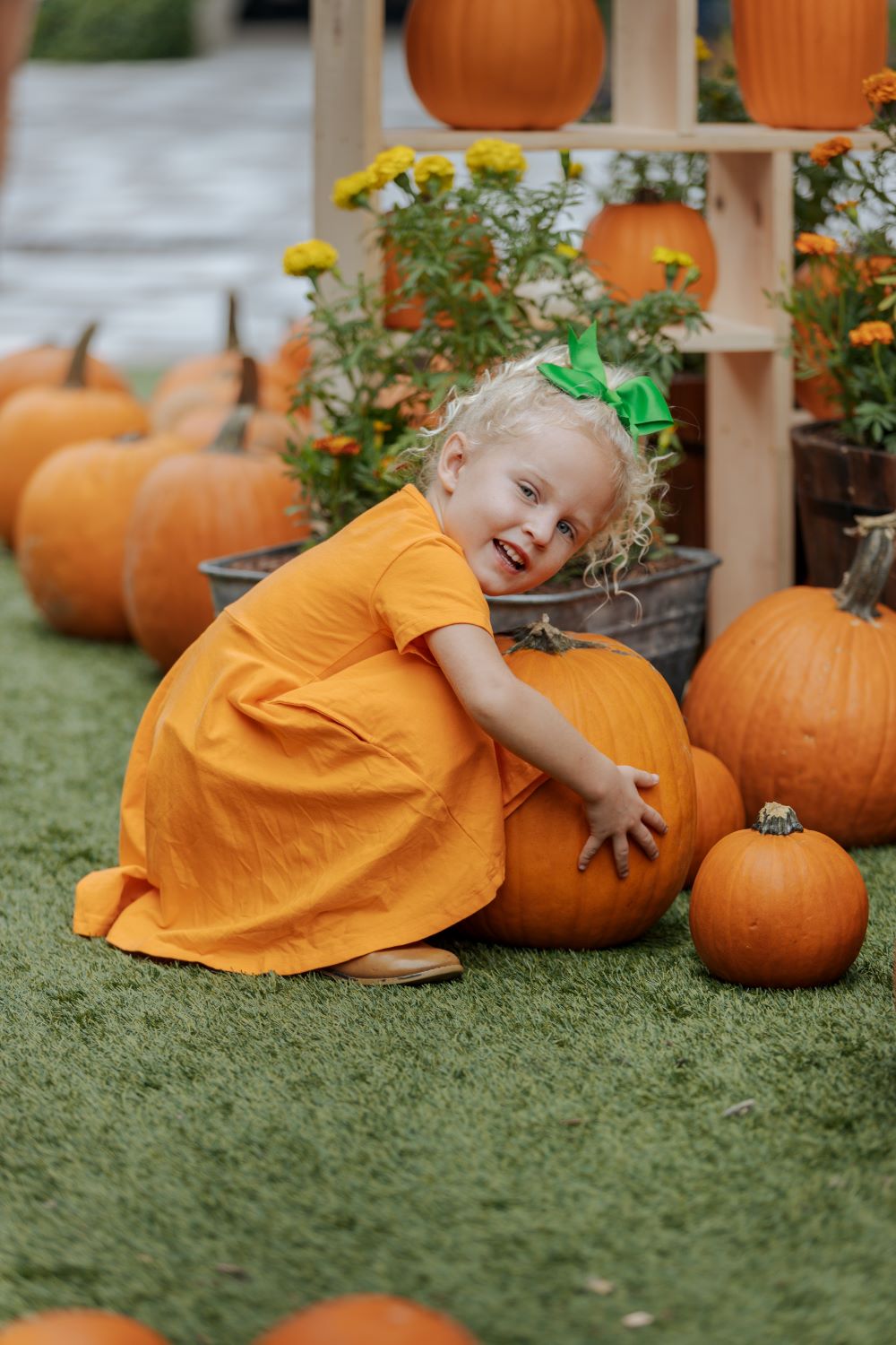 Girl hugging a pumpkin