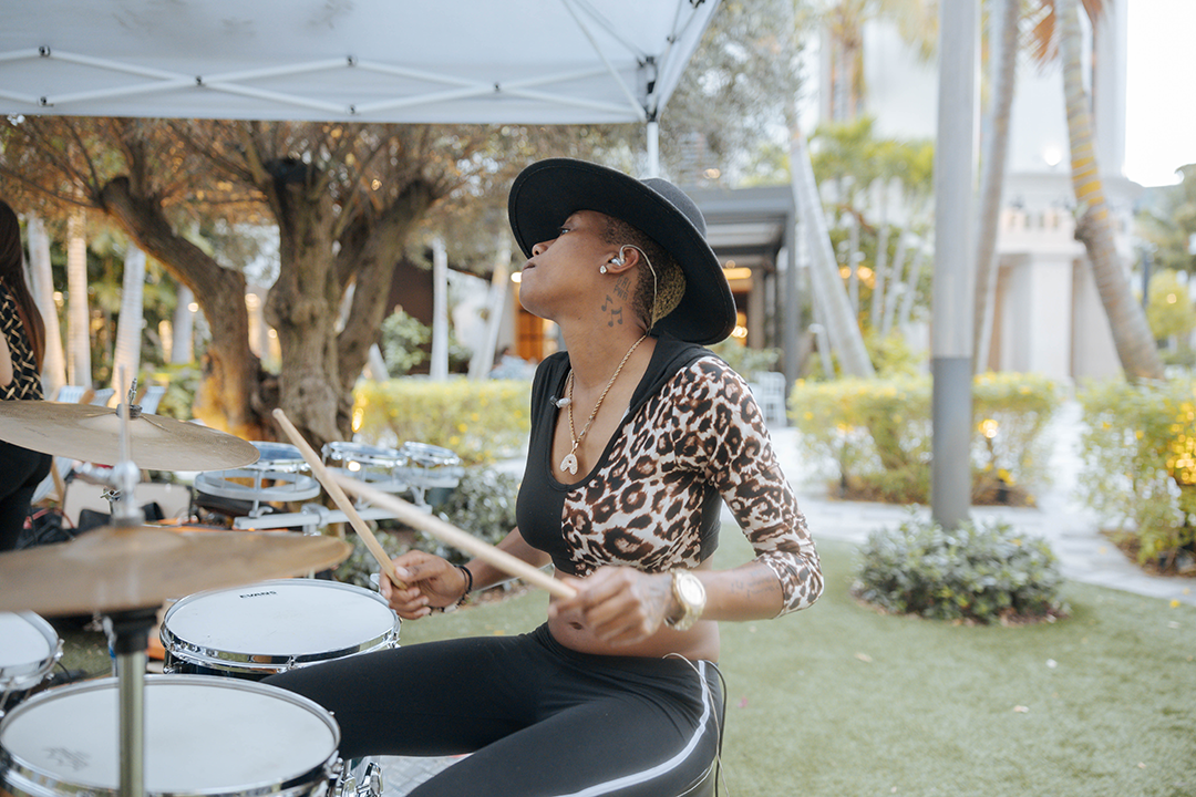 Woman playing the drums