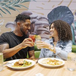 Couple dining and celebrating with a toast 